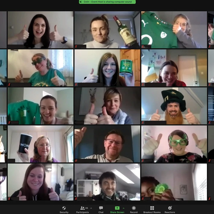 Virtual St Patrick’s Day team building quiz with teams playing an Irish themed quiz on mobile and laptop