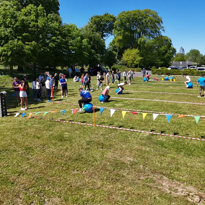 space hoppers during outdoor team building challenger activity ireland in the sun