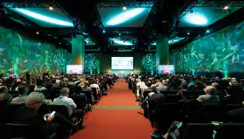 Large corporate conference in Dublin with stage, screens and full audience managed by Dynamic Events Ireland