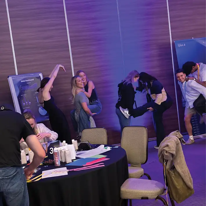 Large group team training activity in Mexico City with participants collaborating and completing physical challenges