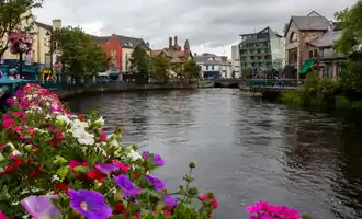 View of Sligo town with the Garavogue River and colourful flowers, popular setting for corporate events and team building in the west of Ireland