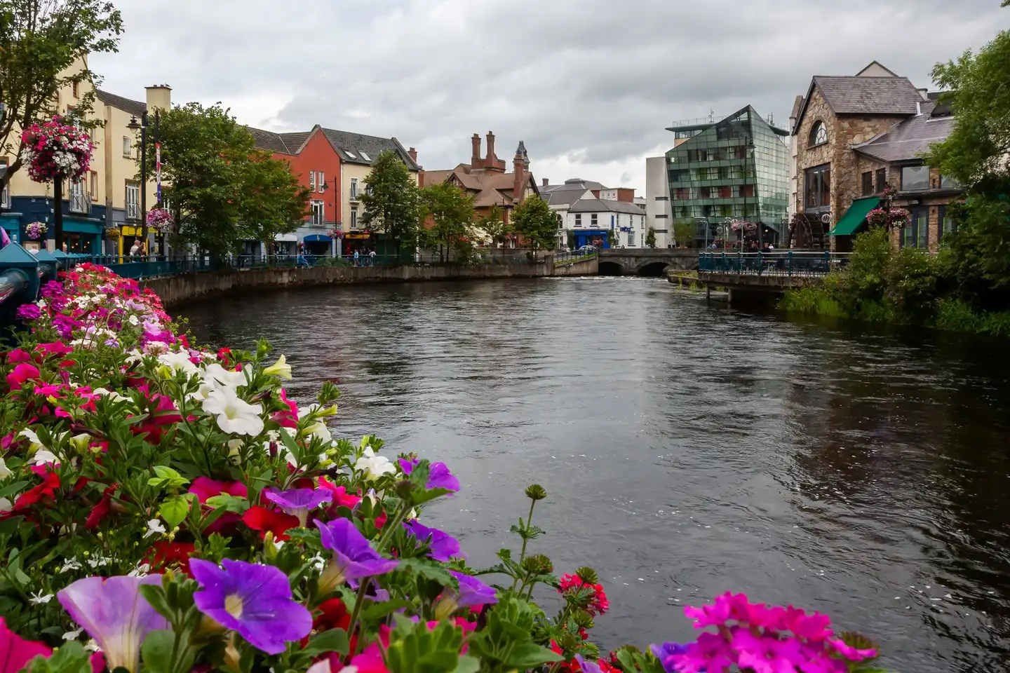 View of Sligo town with the Garavogue River and colourful flowers, popular setting for corporate events and team building in the west of Ireland