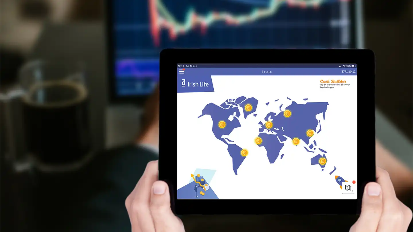 holding ipad with bespoke learning and development game