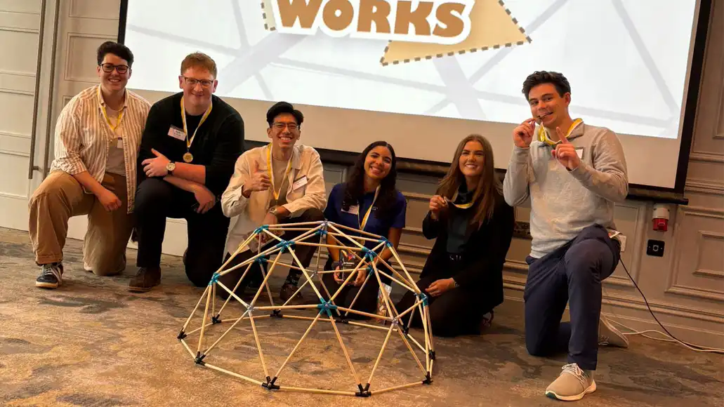 happy team after winning dome works graduate team building activity in dublin ireland
