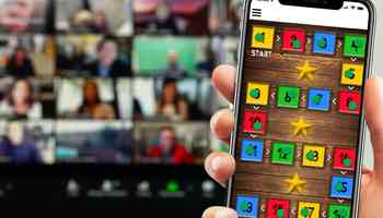 Remote team taking part in a Virtual Away Day team building event with an online challenge displayed on a smartphone.