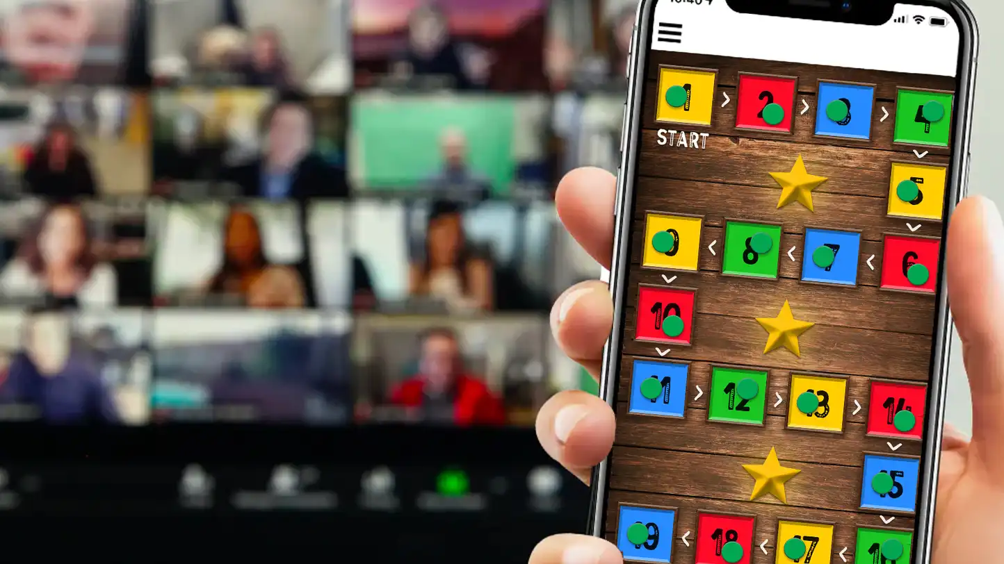 Remote team taking part in a Virtual Away Day team building event with an online challenge displayed on a smartphone.