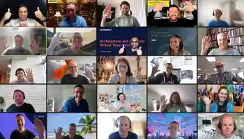 Remote teams smiling and waving during a live virtual escape room video call, connecting through online team building activities for remote and hybrid groups