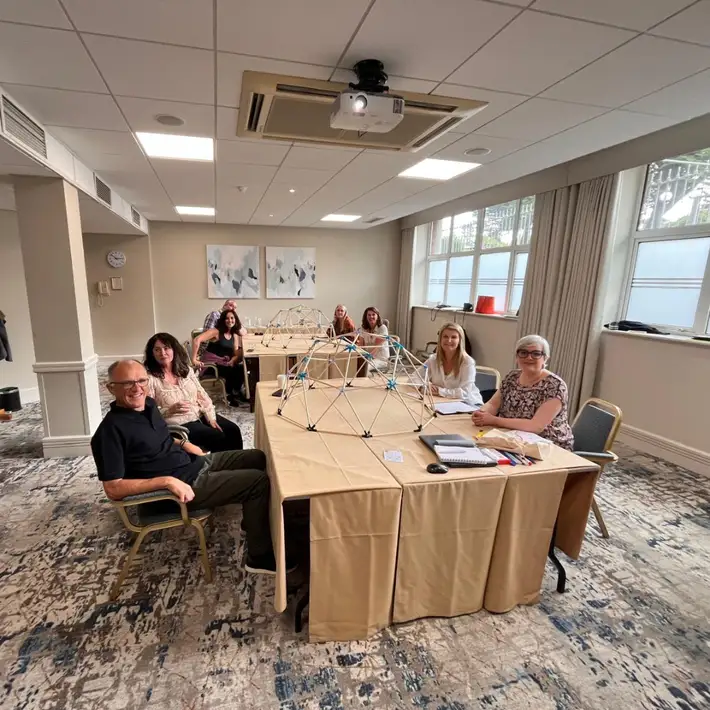 group sitting down with domeworks