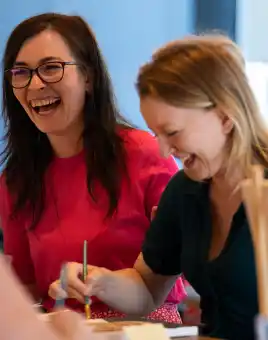 small team collaborating during a hands-on team building activity in ireland