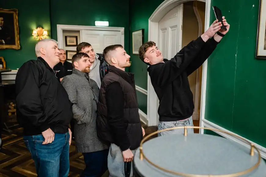 team taking a selfie at their kick off team building activity in ireland