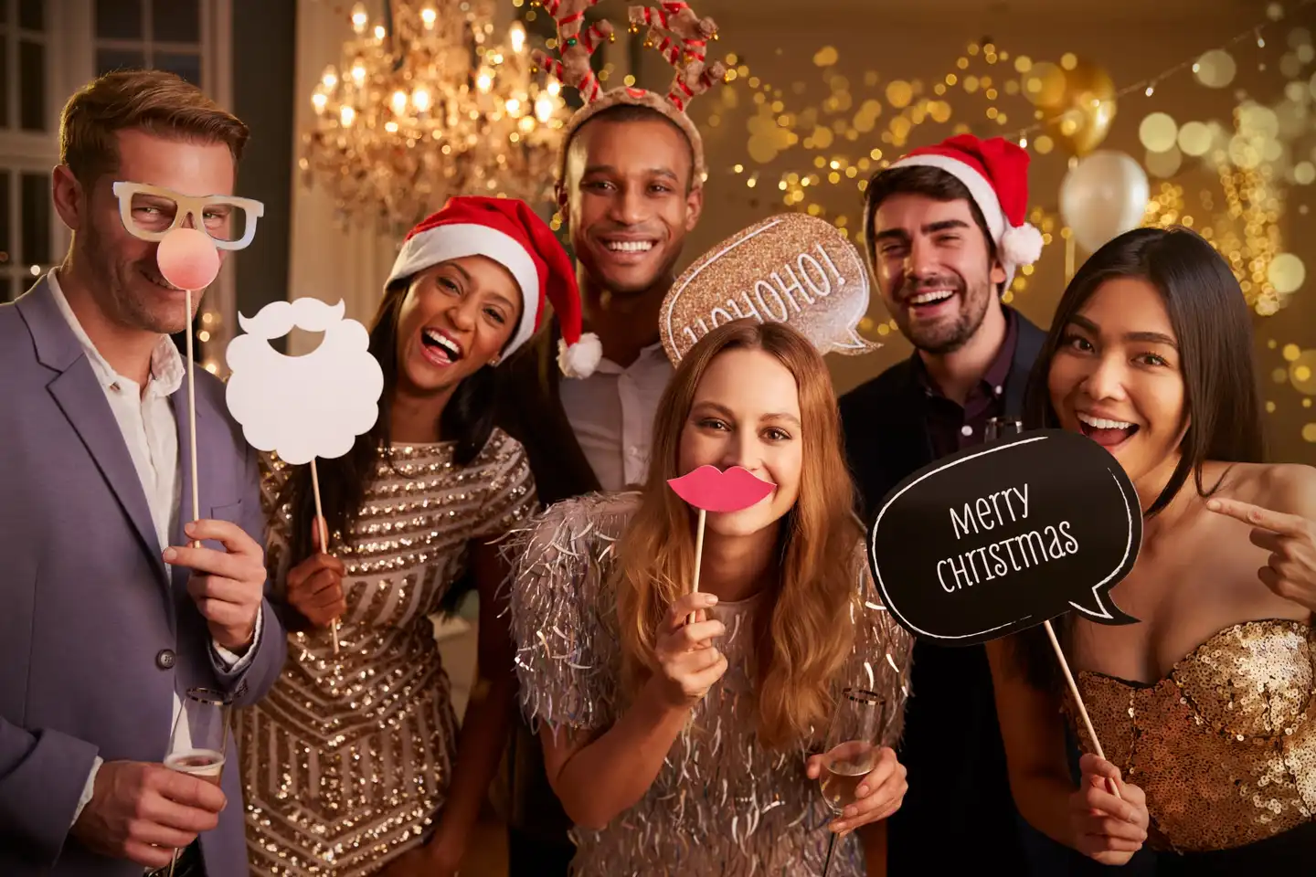 people wearing fun props at christmas party