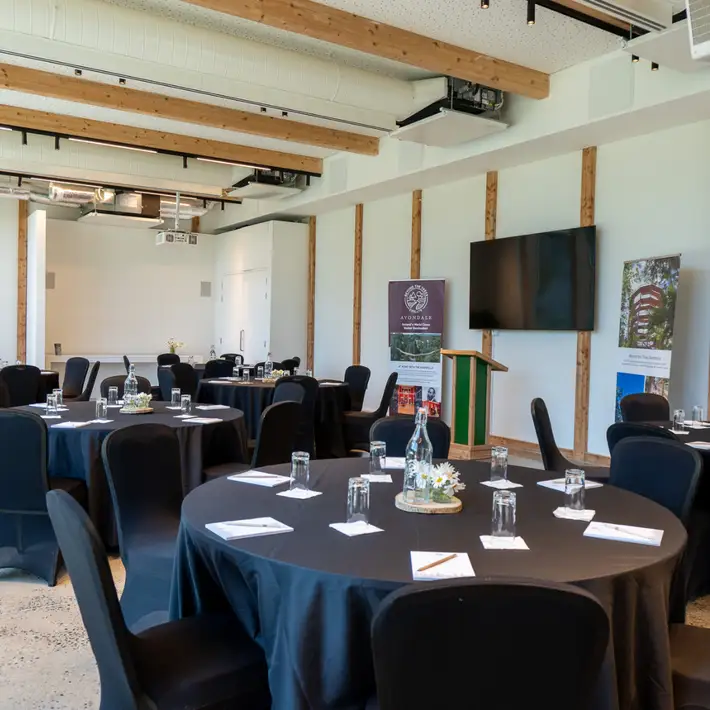 Catering setup featuring fresh pastries and coffee for a corporate morning break