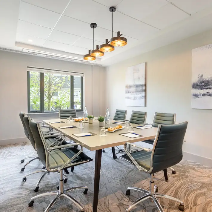 Modern boardroom at Limerick Strand Hotel set for corporate meetings and strategy sessions