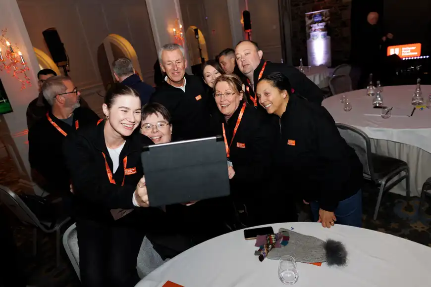 happy team of new corporate hires doing onboarding in Dublin