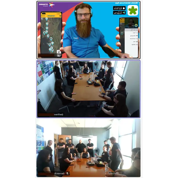 Remote host briefing corporate team on a digital treasure hunt via video call while team gathers in office meeting room
