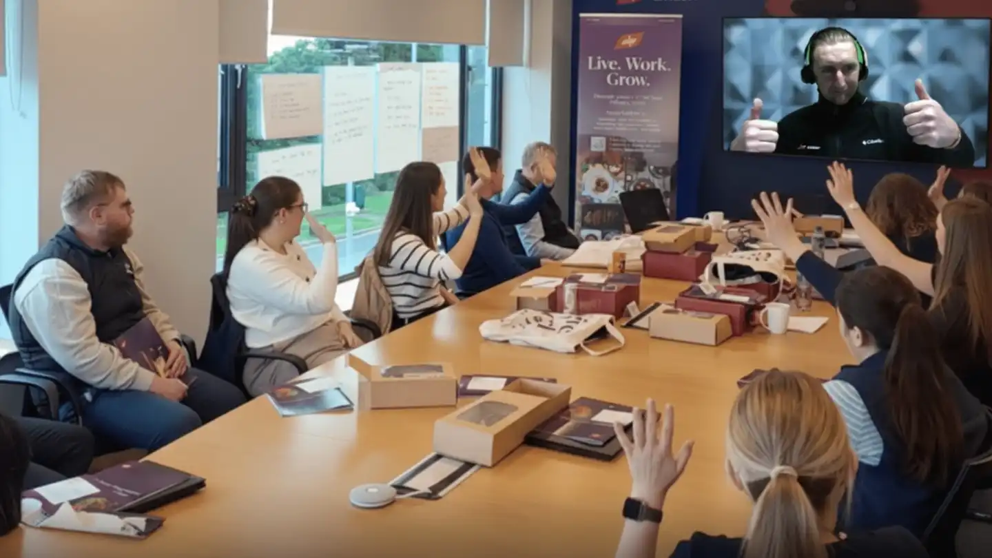 ABP Food Group graduates joining a multi location digital treasure hunt across Ireland and the UK, with a remote event host briefing teams live over video call.
