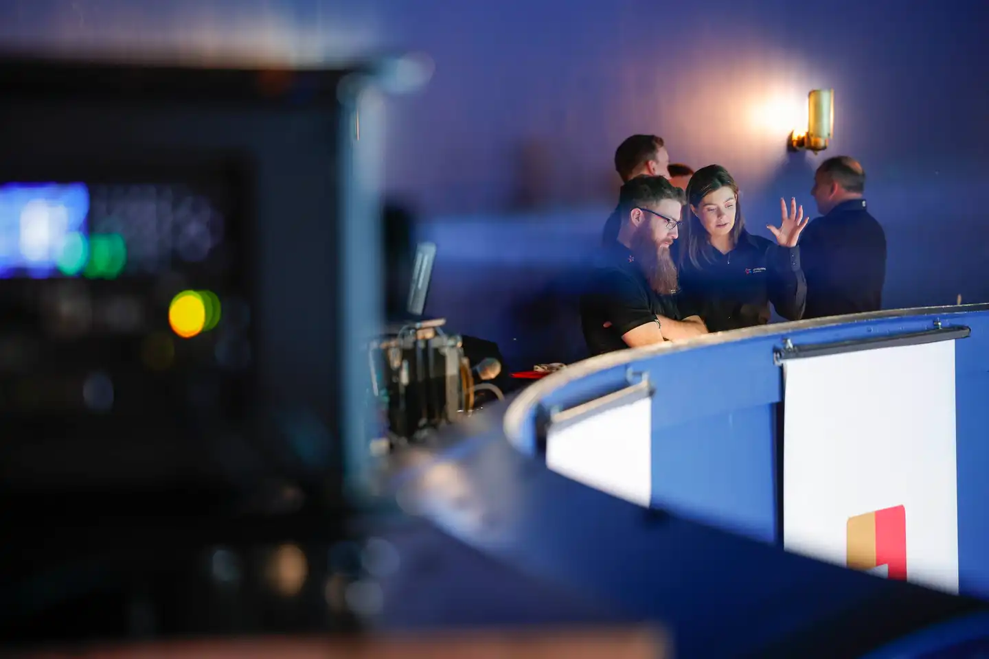 Dynamic Events team members discussing event production details during a corporate event in Ireland.