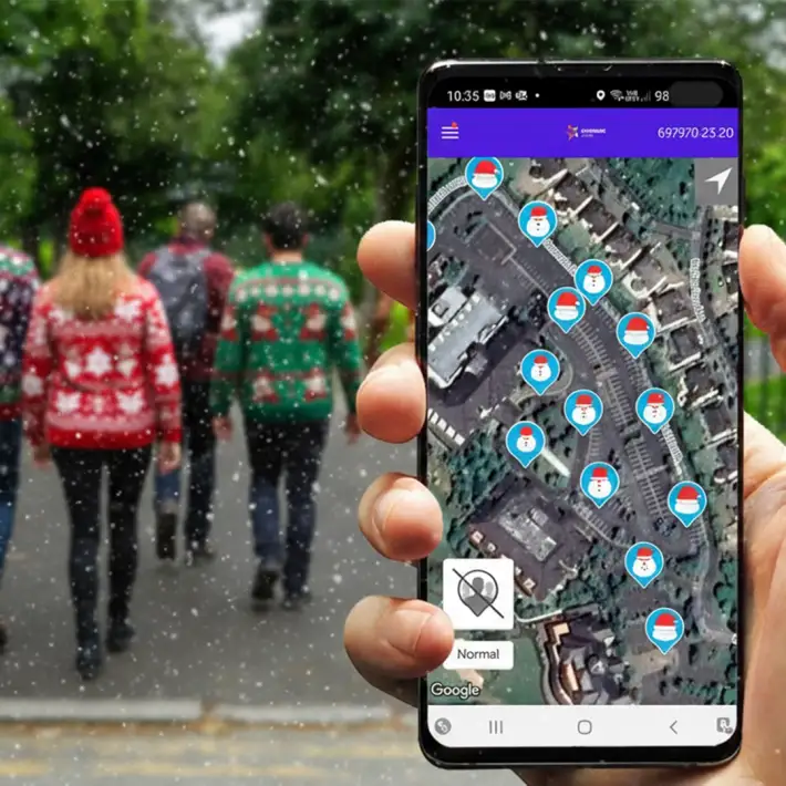 Christmas team building treasure hunt in Ireland with GPS map app guiding teams to festive challenges