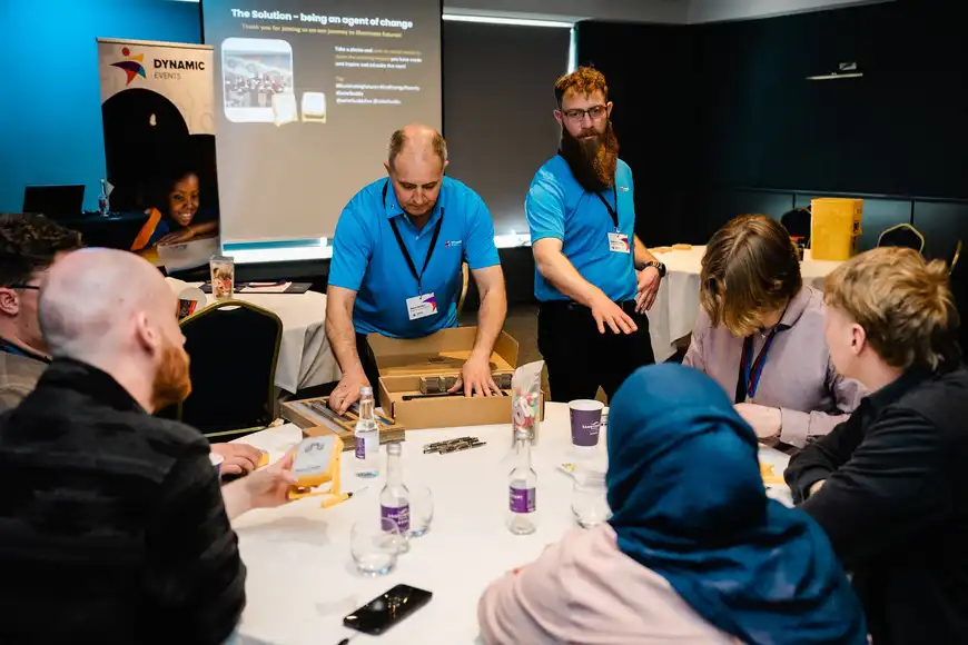 Facilitator guiding corporate leaders through a leadership development activity in Ireland