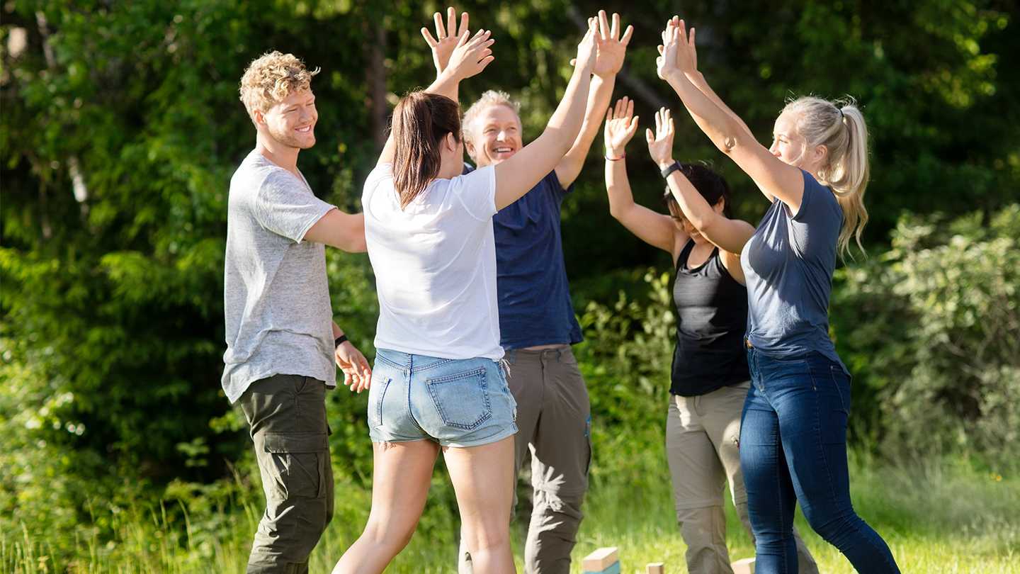 happy group doing team building