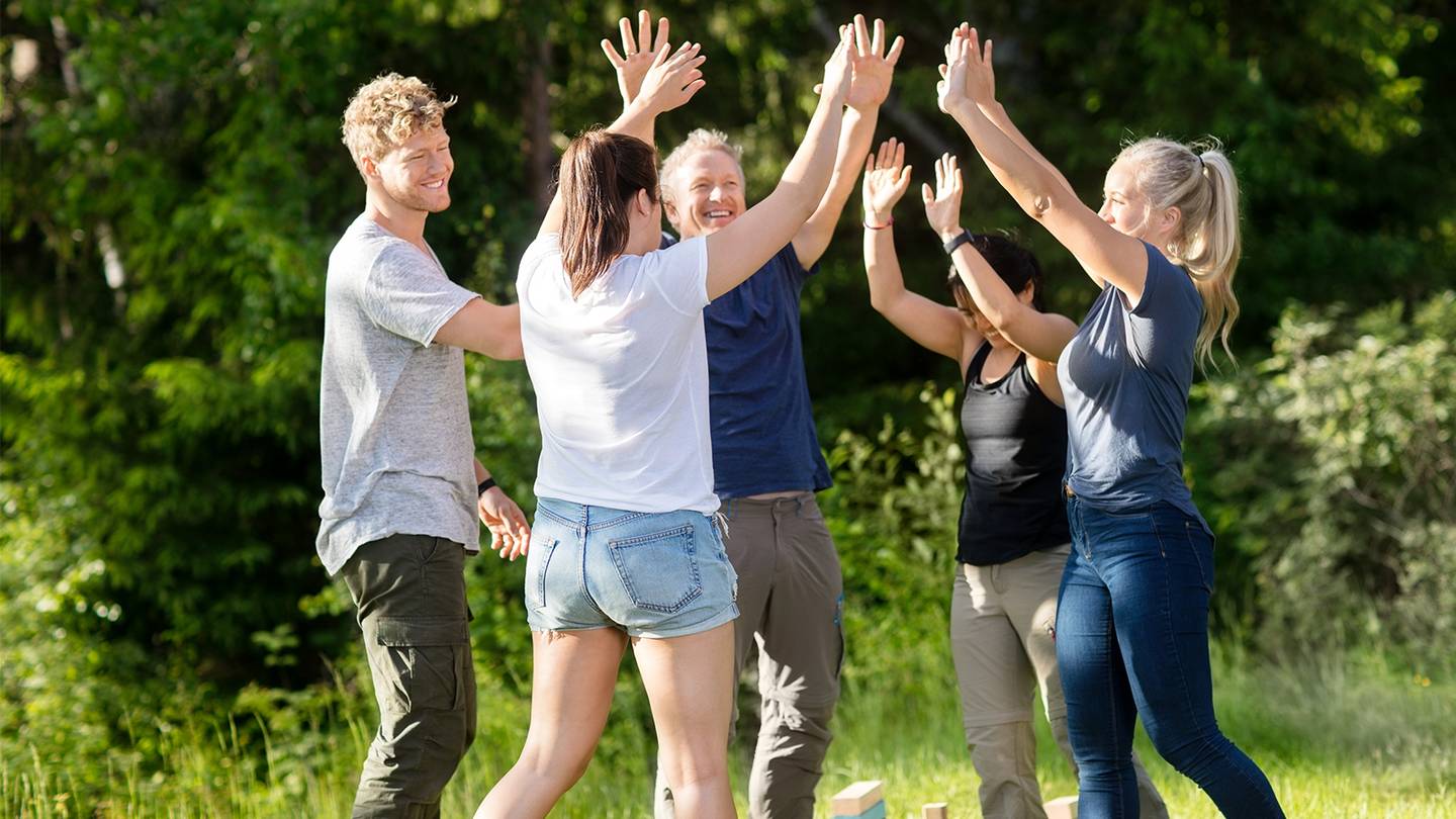 happy group doing team building
