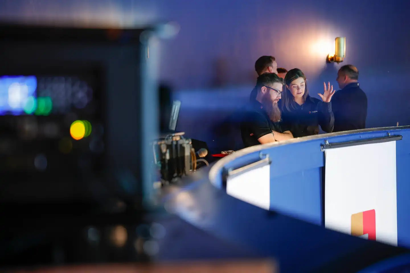 Dynamic Events team members discussing event production details during a corporate event in Ireland.