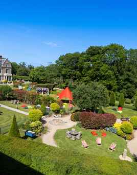 Beautiful landscaped gardens set up with outdoor team building activities at Killashee Hotel on a sunny summer day