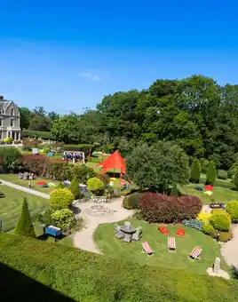 Beautiful landscaped gardens set up with outdoor team building activities at Killashee Hotel on a sunny summer day
