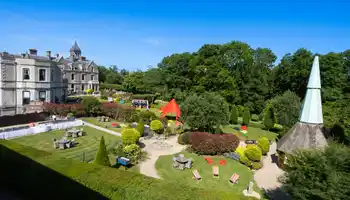 Beautiful landscaped gardens set up with outdoor team building activities at Killashee Hotel on a sunny summer day