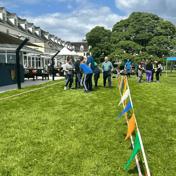 team taking part in gutters activity and working with the pipes and balls