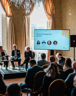 Conference setup at MoLI Dublin with staging and AV prepared for Microsoft AI event