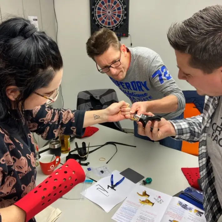 team building a prosthetic arm together 