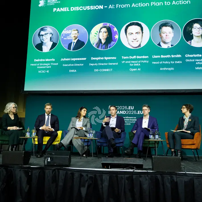 Panel discussion with five speakers on stage at the Cyber Security Conference and Expo in Ireland.
