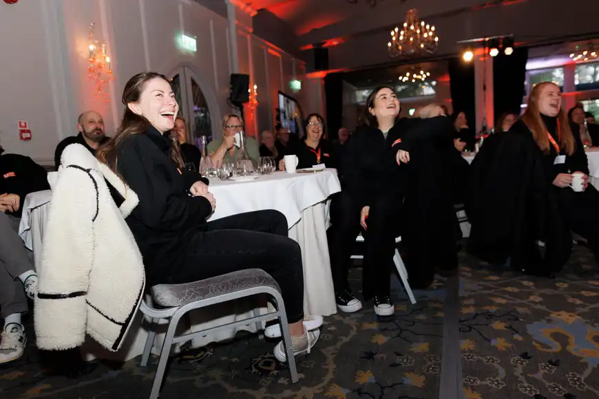 Senior leaders enjoying a team building session indoors during a corporate leadership event in Ireland