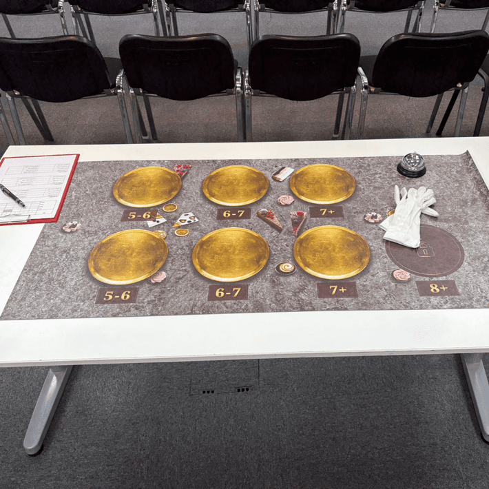 Close up of the finsihing stations with amount of ingredients added into each of the plates
