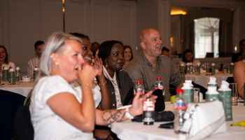 Employees enjoying a company away day team building activity in Dublin, Ireland