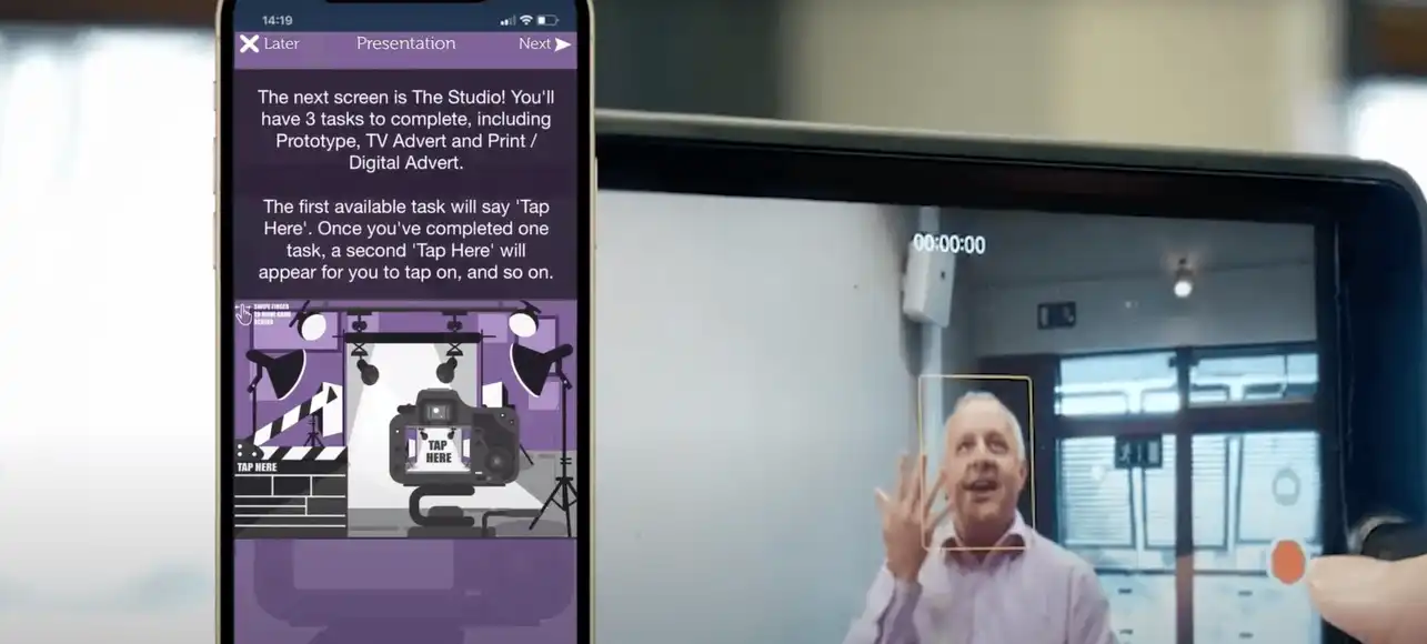 Corporate team taking a selfie during The Pitch business simulation activity