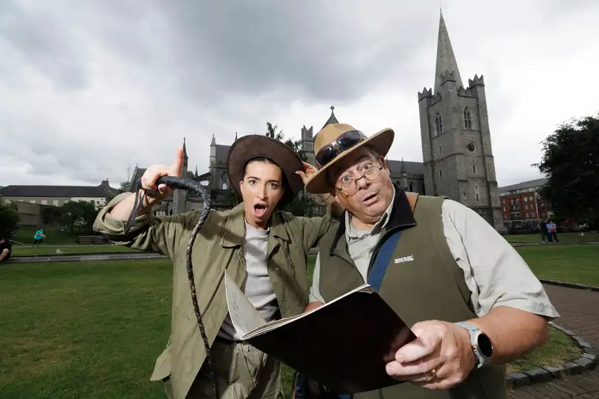 Outdoor Halloween team building challenge with actors in explorer costumes near St Patrick’s Cathedral Dublin