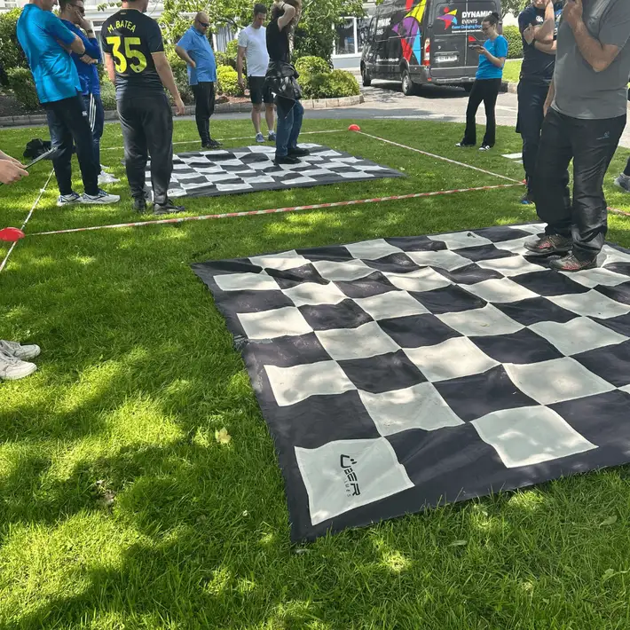 Team figuring out the maze activity and picking which block to do next 