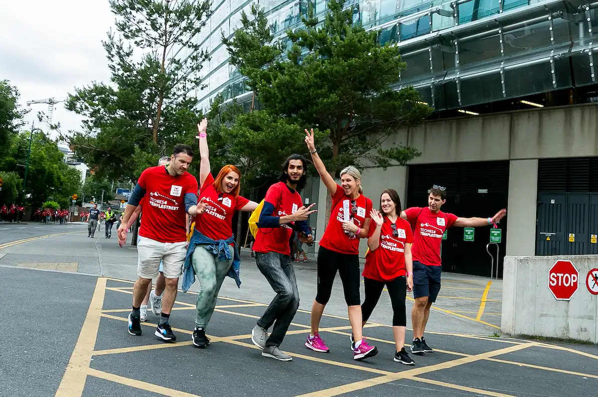 University staff team taking part in an outdoor urban team building activity in Dublin, organised by Dynamic Events Ireland.