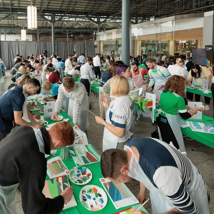 group doing big picture team building activity