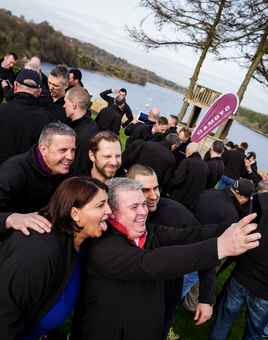 Employees taking part in outdoor team building summer activities during a company event in Ireland