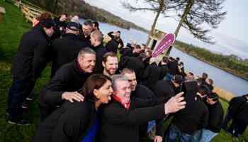 Employees taking part in outdoor team building summer activities during a company event in Ireland