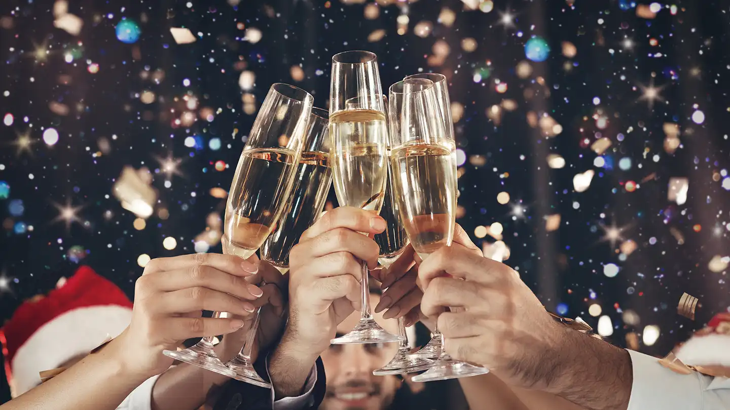 Team toasting with champagne glasses at a corporate Christmas party in Ireland