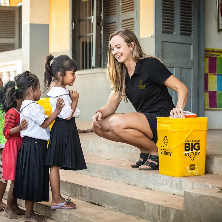 SolarBuddy being distributed our to kids 