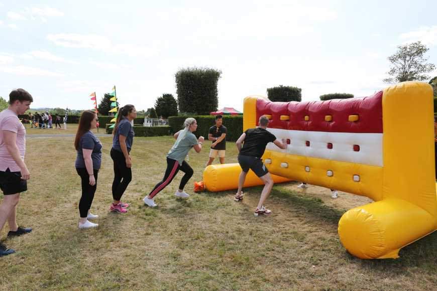 Interactive inflatable obstacle team building activity in Shannon for corporate events