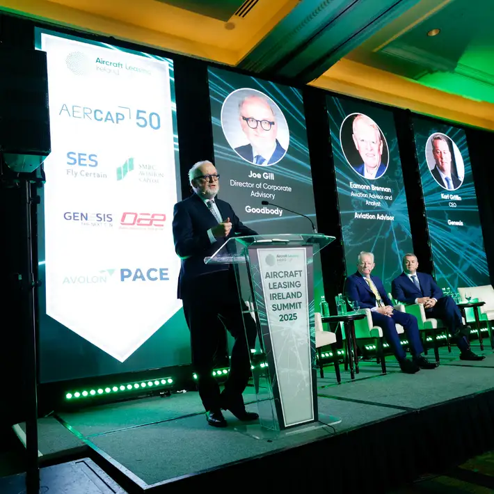 Joe Gill up on stage talking introducing the next panel of people