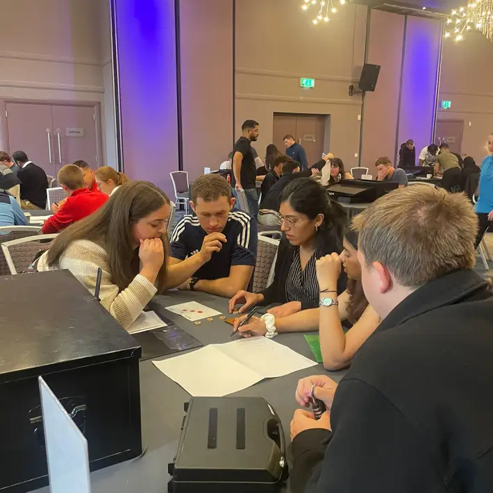 Sisk graduate programme participants solving challenges in the Dynamic Events Code Breaker activity