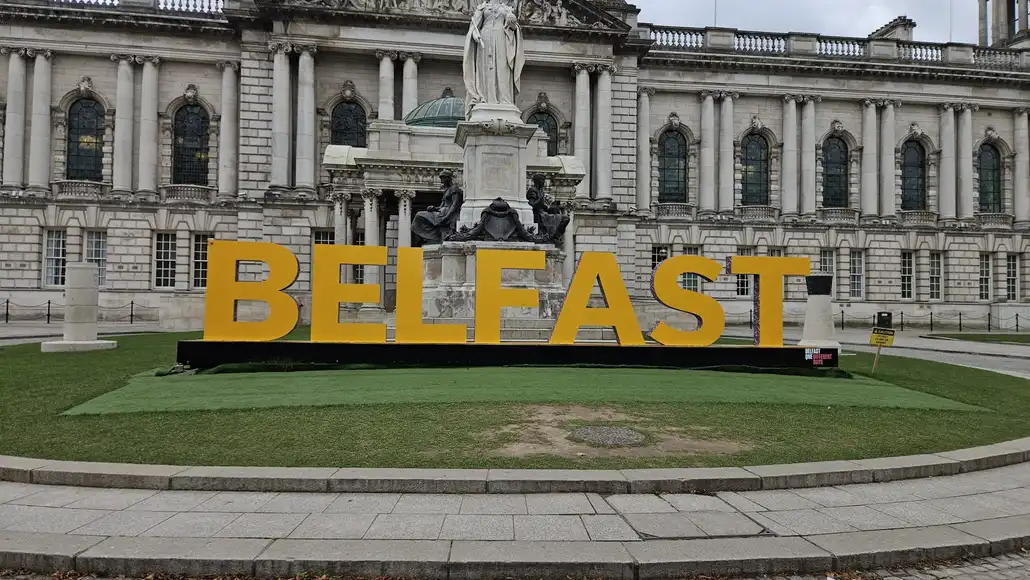 Belfast yellow Signage outside queens university
