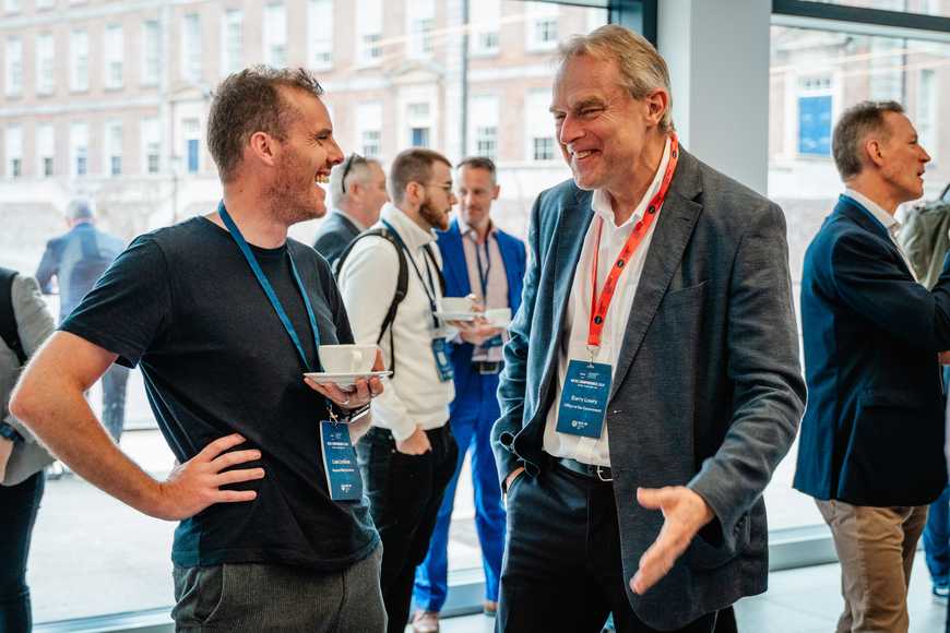 Executives networking and connecting at a leadership team event in Dublin